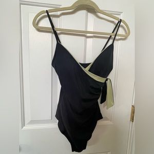 One piece swimwear. Size 6. Black/green